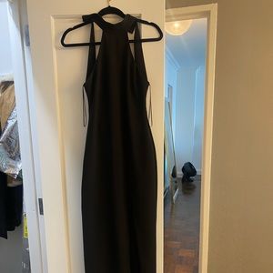 worn once: high neck, low back, slit black gown. Very comfortable, stretchy